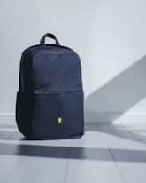colorful background, product sourcing result, minimalist navy backpack, accessories trend research, winning bag